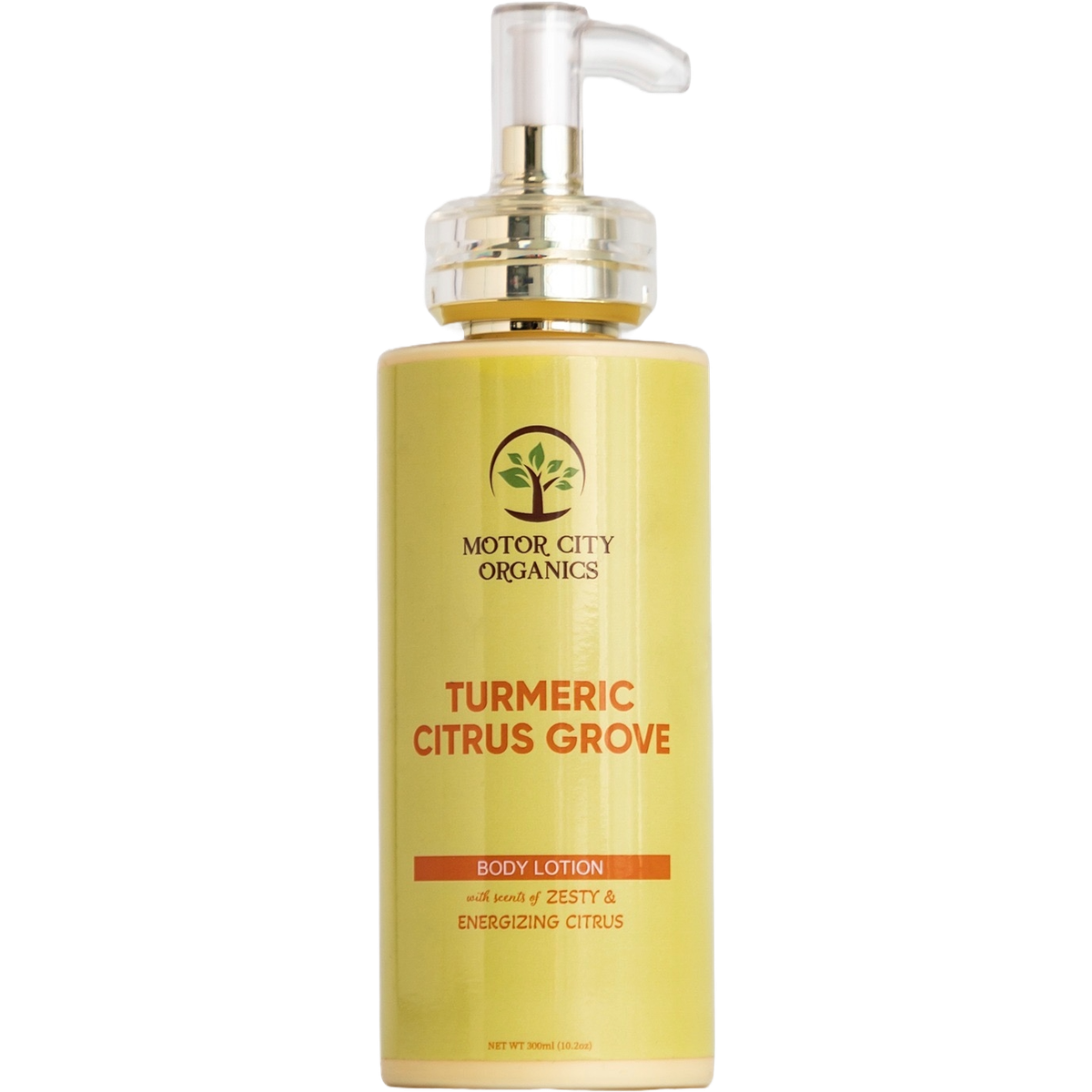 Turmeric Citrus Grove Body Lotion bottle, golden cream behind transparent glass
